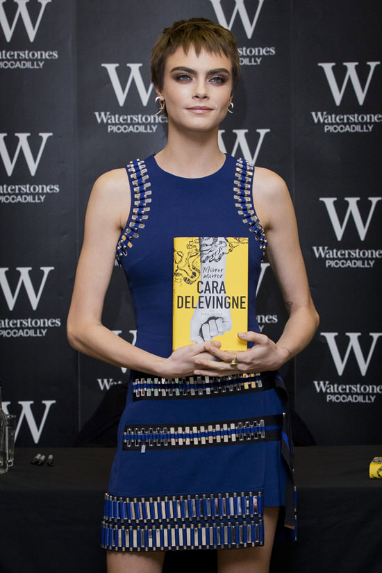 Cara Delevingne Keeps Things Cool at the “Mirror, Mirror” Book Signing