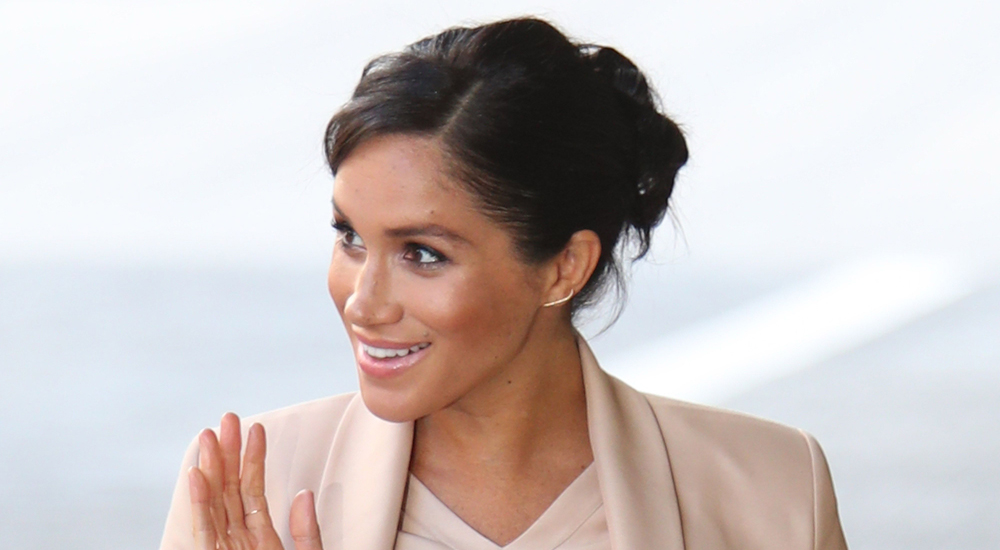 Meghan Markle Gets Blush-y as She Visits The National Theatre in