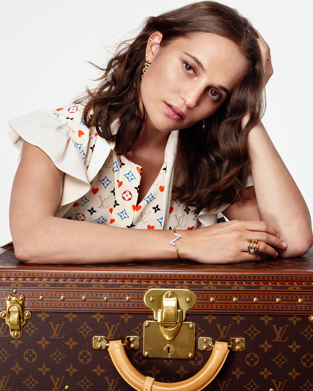 poster advertising Louis Vuitton handbag with Alicia Vikander