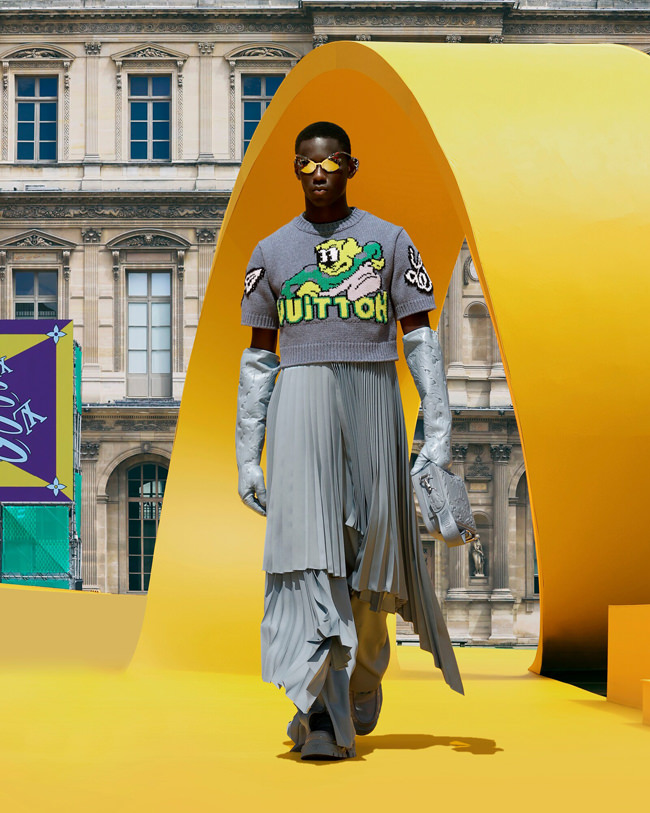 Louis Vuitton inserts a yellow racetrack at the Louvre for Spring Summer  2023 show
