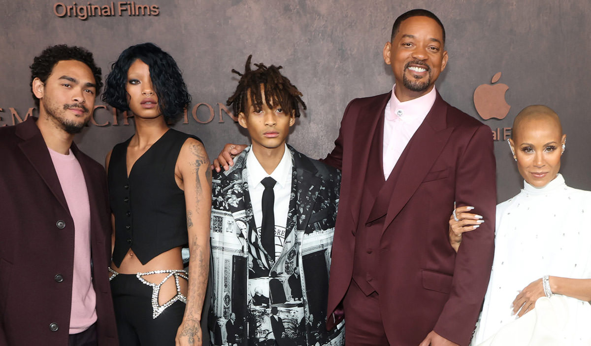 Jaden Smith Trey Smith, Will Smith Willow Smith, Jada Pinkett Smith  (Wearing Christian Louboutin Shoes And Carrying A 