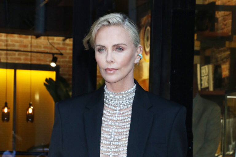 Charlize Theron in Givenchy at the Breitling Boutique Ribbon-Cutting ...